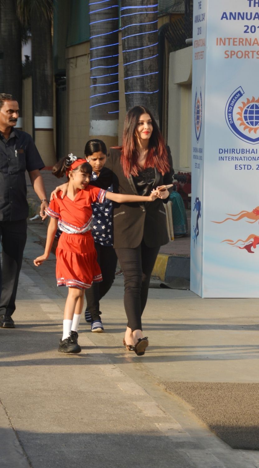 Why is Aishwarya Rai Bachchan always holding her daughter's hands